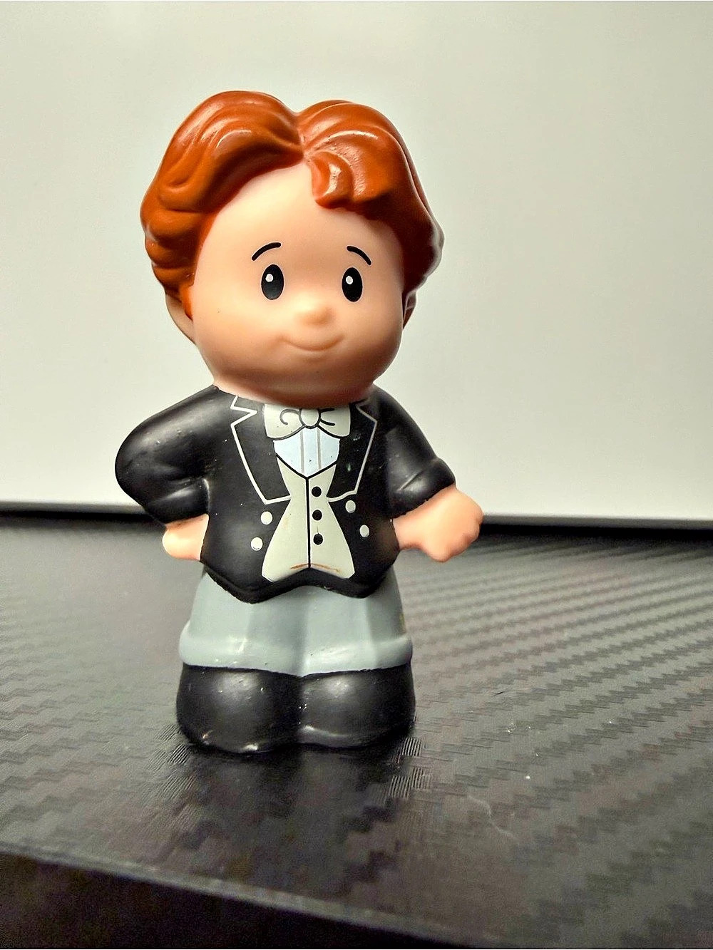 Fisher-Price Little People groom figure from the Fisher-Price Wedding Tube Set